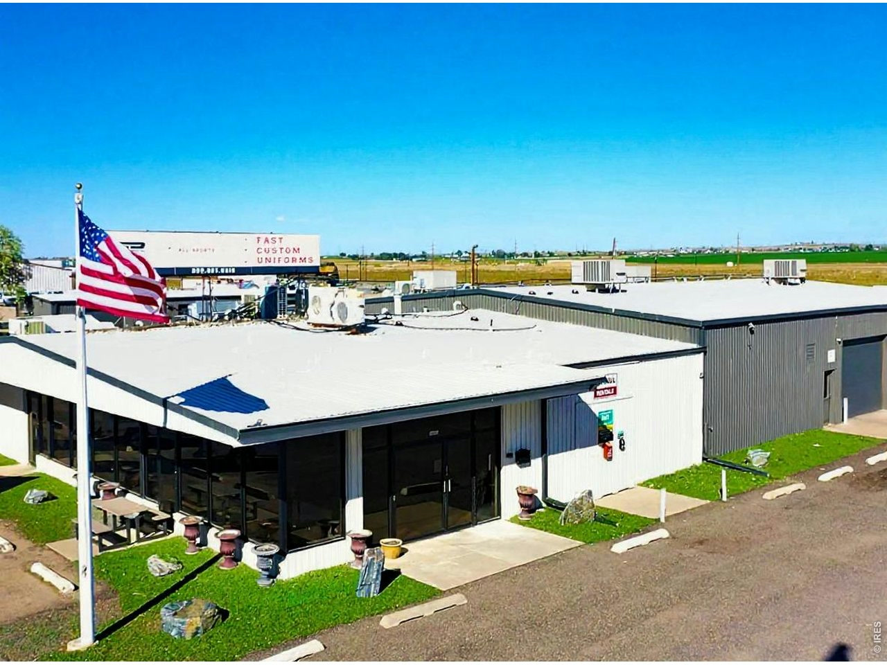 Aerial view of the former Ford dealership facility in Fort Lupton
